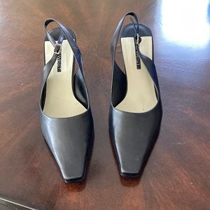 Black leather sling back shoes